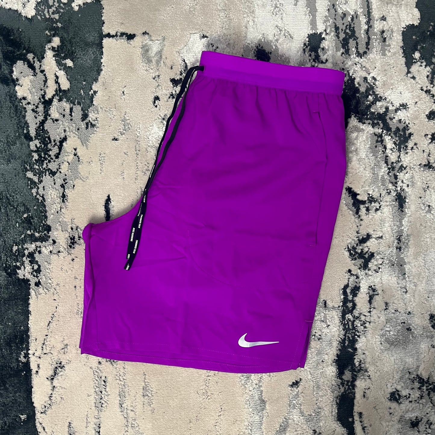 NIKE FLEX STRIDE 7 INCH SHORTS - GRAPE